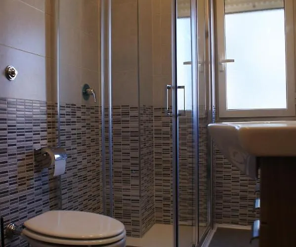 Alojamento de Acomodação e Pequeno-almoço Isole - Rione Alto 3*